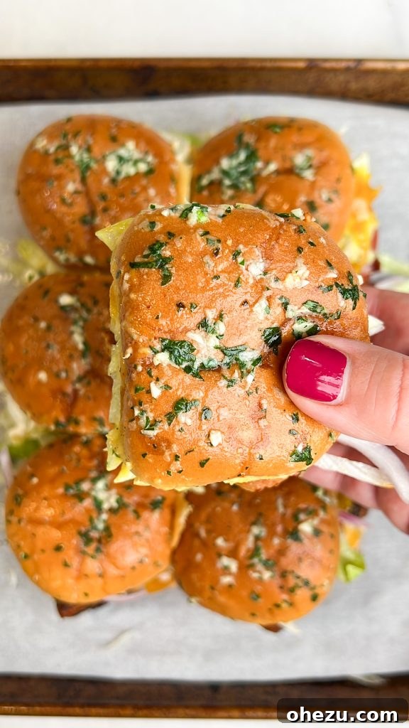 Zesty Honey Mustard Blackened Salmon BLT Sliders 3 Close-up of golden honey mustard sauce being drizzled over salmon sliders