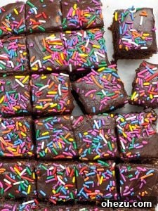 Chocolate Donut-Frosted Cake Bites Recipe, covered in sprinkles