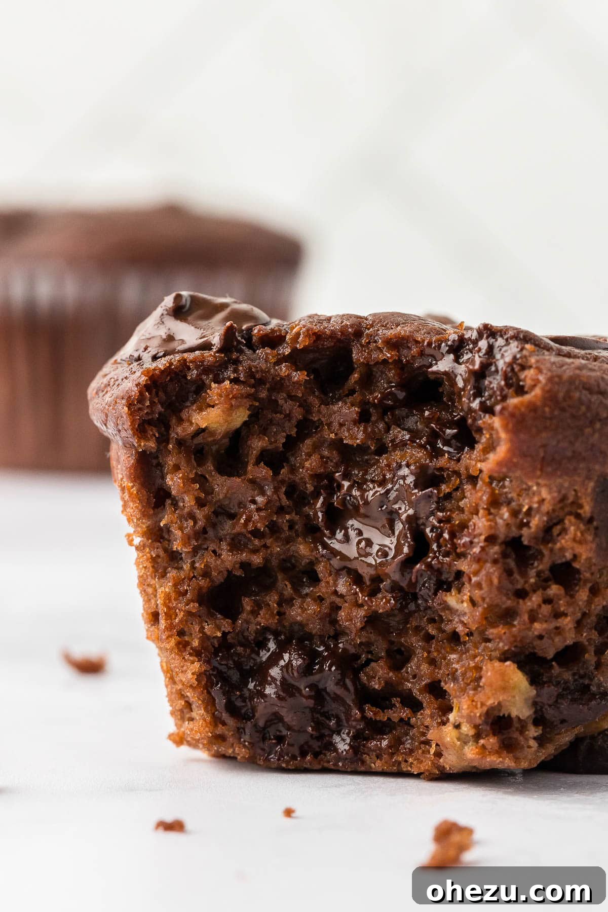 healthy chocolate muffin with a bite taken out