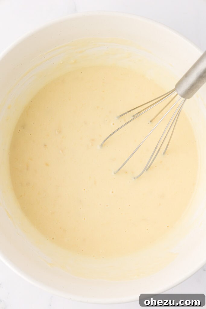wet ingredients whisked together in a mixing bowl