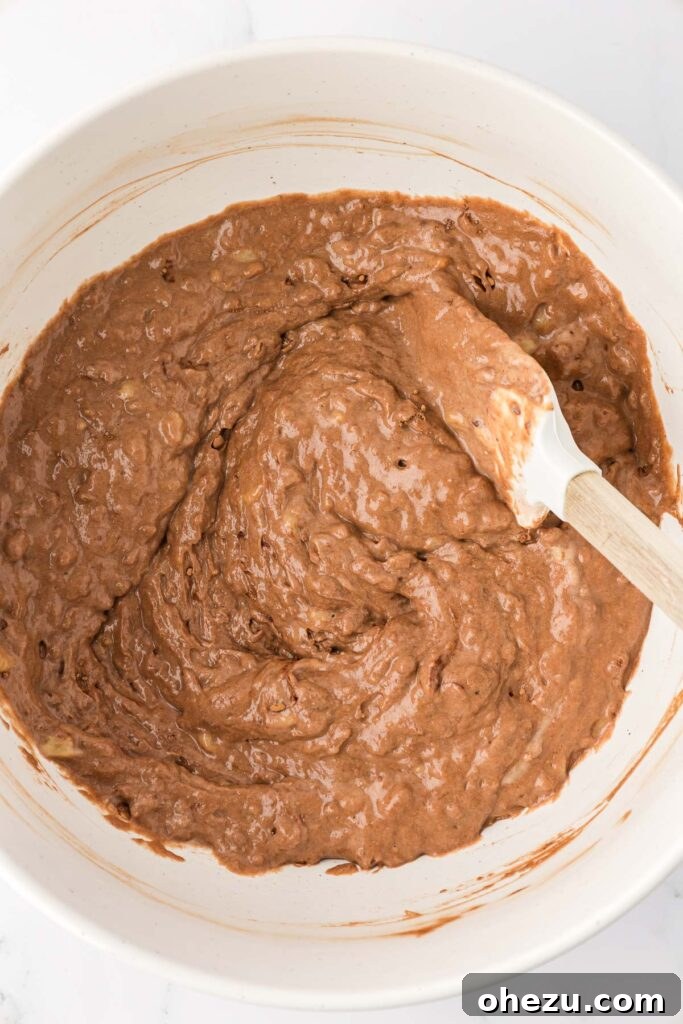 chocolate muffin batter in a mixing bowl