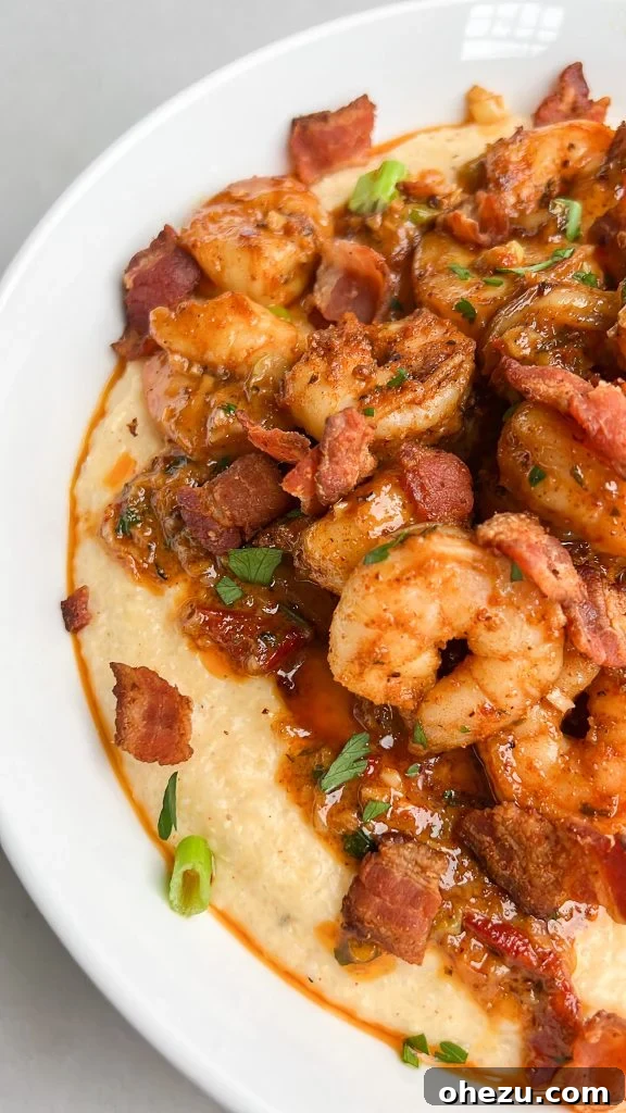 Down-Home Southern Shrimp and Grits 3 Close-up of creamy Southern Shrimp and Grits with bacon and sauce