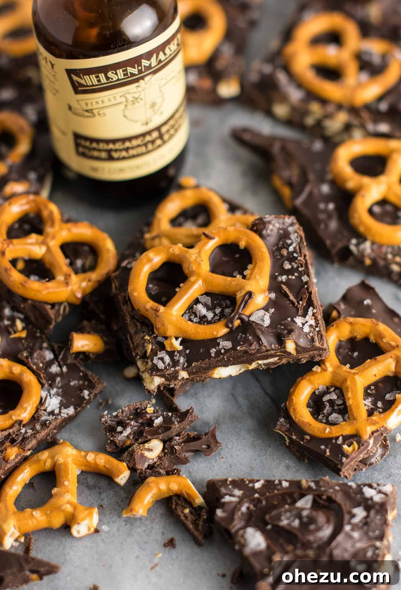 Vegan Sweet & Salty Chocolate Pretzel Bark 3 Close-up of freshly made Vegan Chocolate Sea Salt Pretzel Bark, highlighting the rich chocolate, crunchy pretzels, and shimmering sea salt flakes.