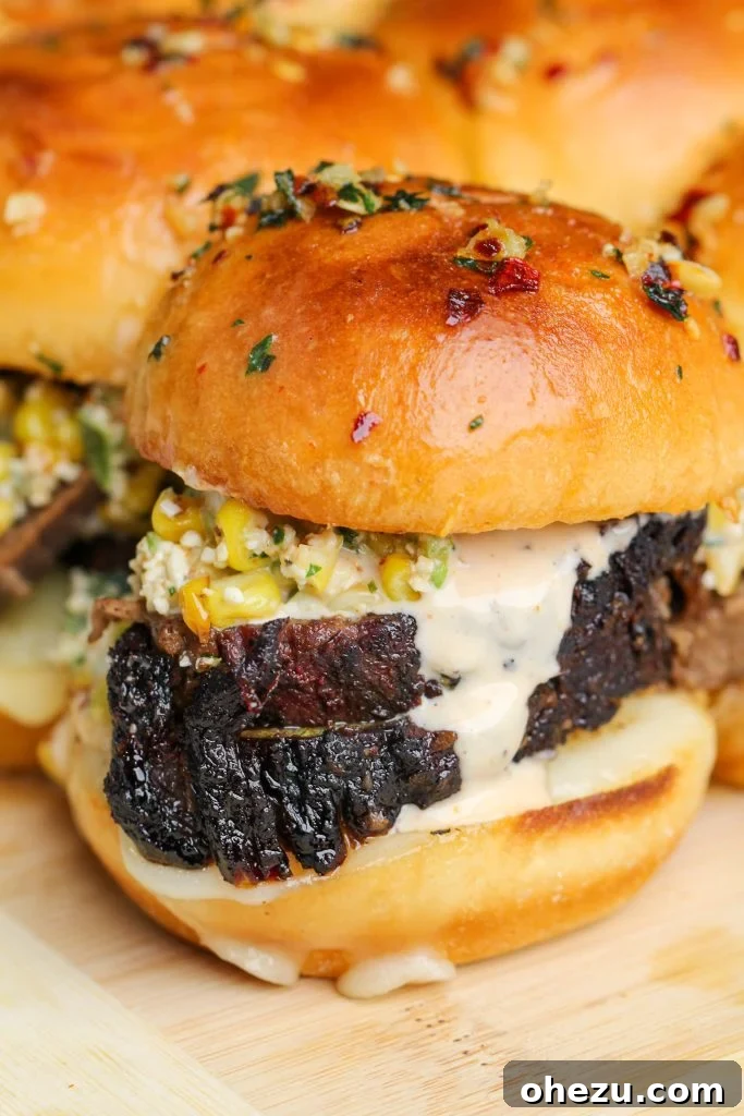 Smoky Brisket & Creamy Elote Sliders with Tangy Alabama White BBQ 2 Tender Smoked Brisket Sliders with Elote Street Corn and Alabama White BBQ Sauce