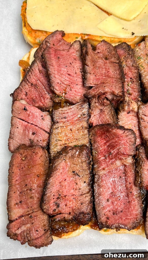 cowboy butter steak sliders on a serving board