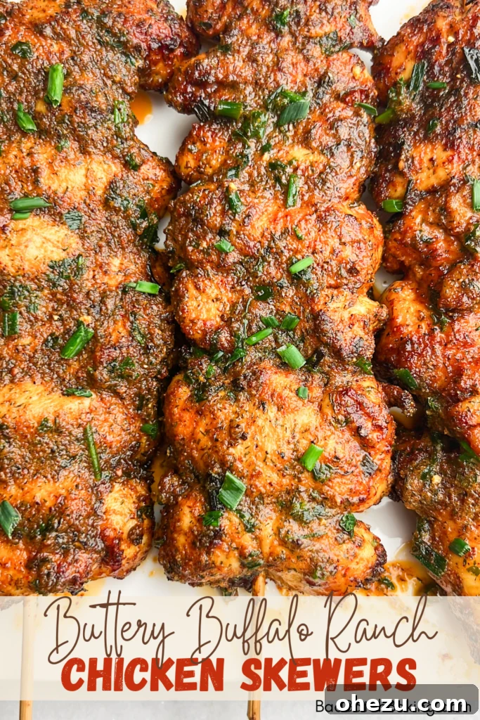 Arrangement of key ingredients for Buffalo Ranch Chicken Skewers: fresh chives, butter, chicken, and spice bowls