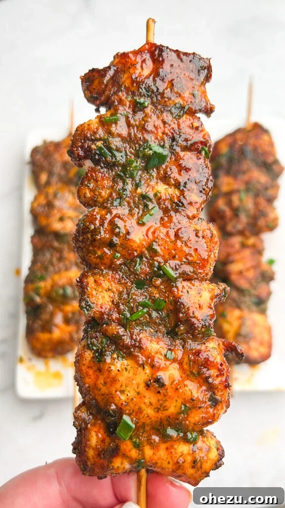 A close-up of a single Air Fryer Buffalo Ranch Chicken Skewer, showcasing its delicious seasoning