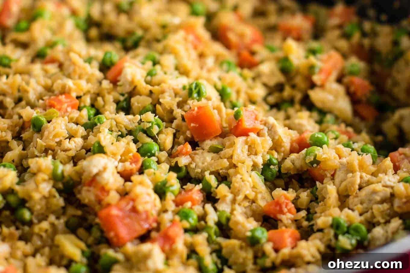 Flavorful Tofu and Cauliflower Rice Stir-Fry 3 This cauliflower tofu fried rice is vegan, gluten free, grain free, and low carb. You won't believe this doesn't have rice or eggs in it! My new favorite dinner recipe! #grainfree #glutenfree #cauliflowerfriedrice #tofufriedrice #vegan #dinner #eggfree