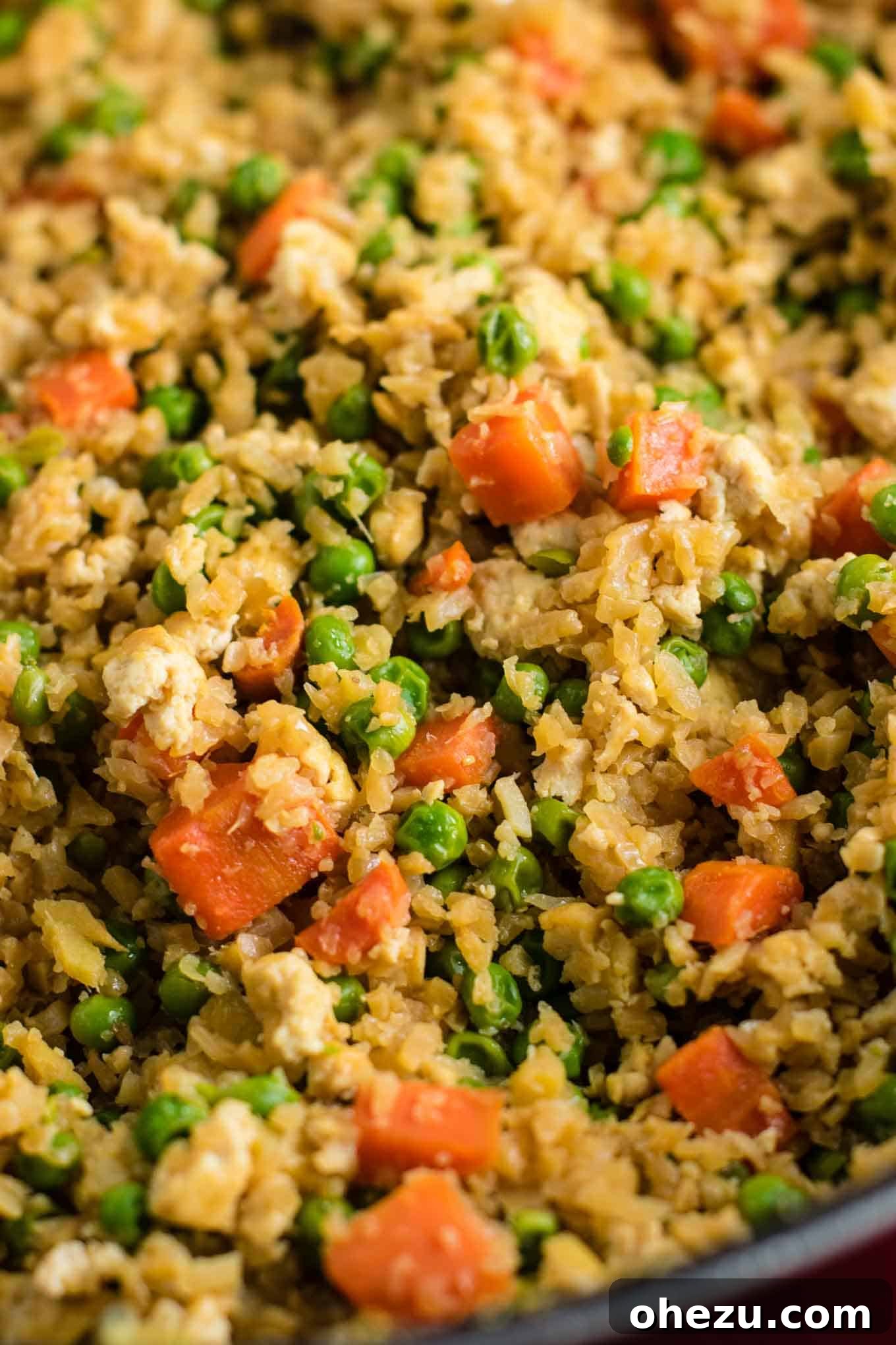 Flavorful Tofu and Cauliflower Rice Stir-Fry 4 This cauliflower tofu fried rice is vegan, gluten free, grain free, and low carb. You won't believe this doesn't have rice or eggs in it! My new favorite dinner recipe! #grainfree #glutenfree #cauliflowerfriedrice #tofufriedrice #vegan #dinner #eggfree