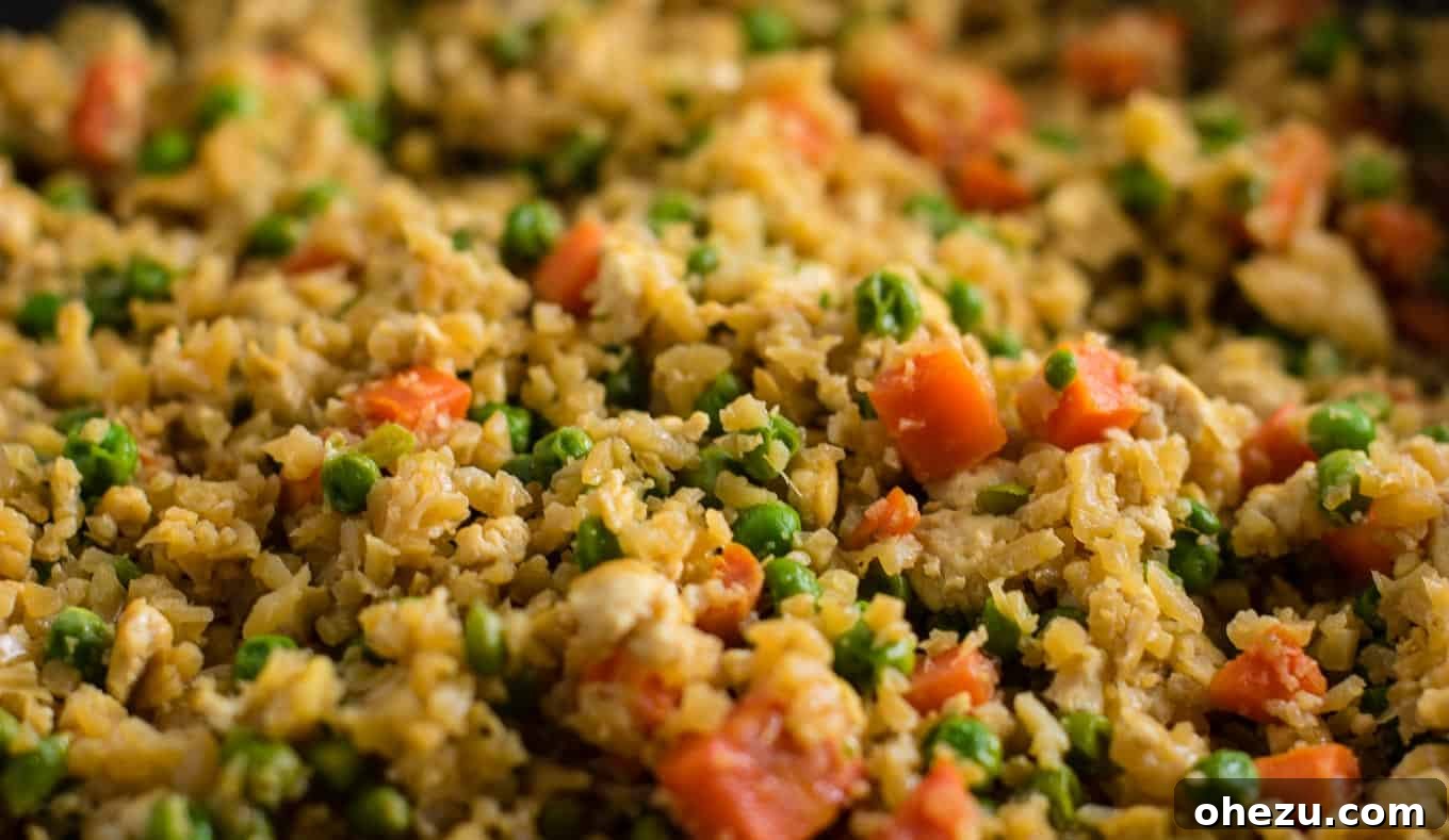 Flavorful Tofu and Cauliflower Rice Stir-Fry 6 This cauliflower tofu fried rice is vegan, gluten free, grain free, and low carb. You won't believe this doesn't have rice or eggs in it! My new favorite dinner recipe! #grainfree #glutenfree #cauliflowerfriedrice #tofufriedrice #vegan #dinner #eggfree