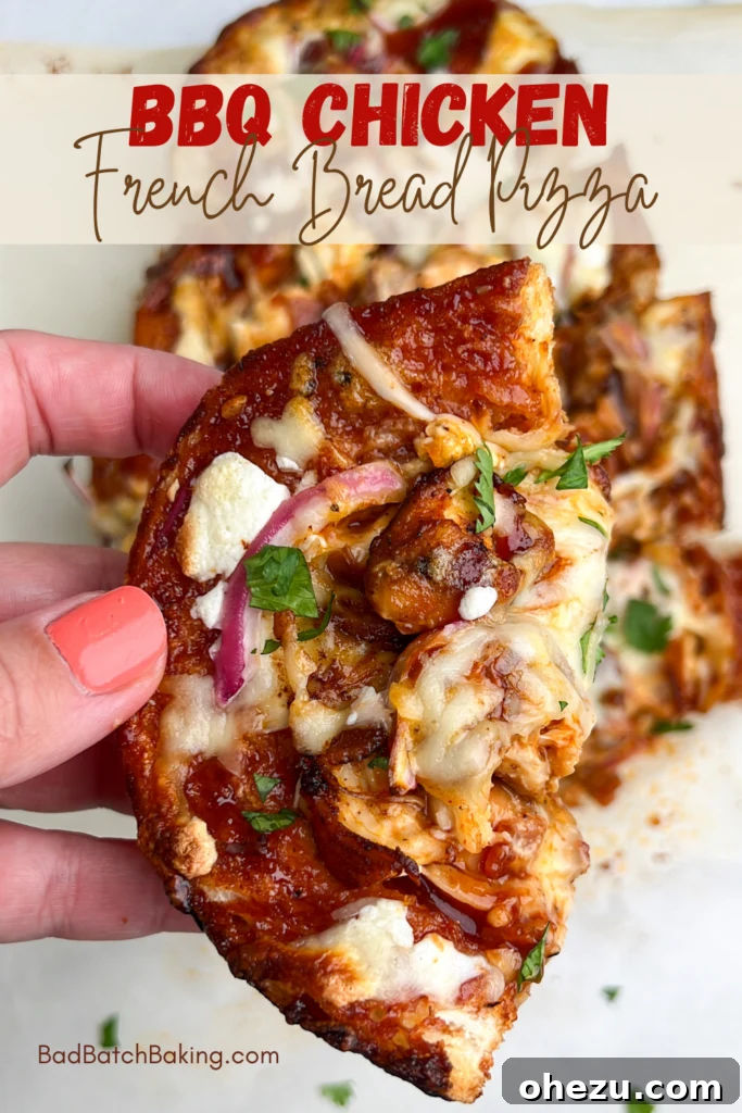 Signature BBQ Chicken French Bread Pizza 9 A beautifully presented BBQ Chicken French Bread Pizza on a wooden serving board.