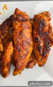 Signature BBQ Chicken French Bread Pizza 5 Step-by-step images showing the preparation of French bread pizza: cooked chicken, bread preparation, and initial layering.
