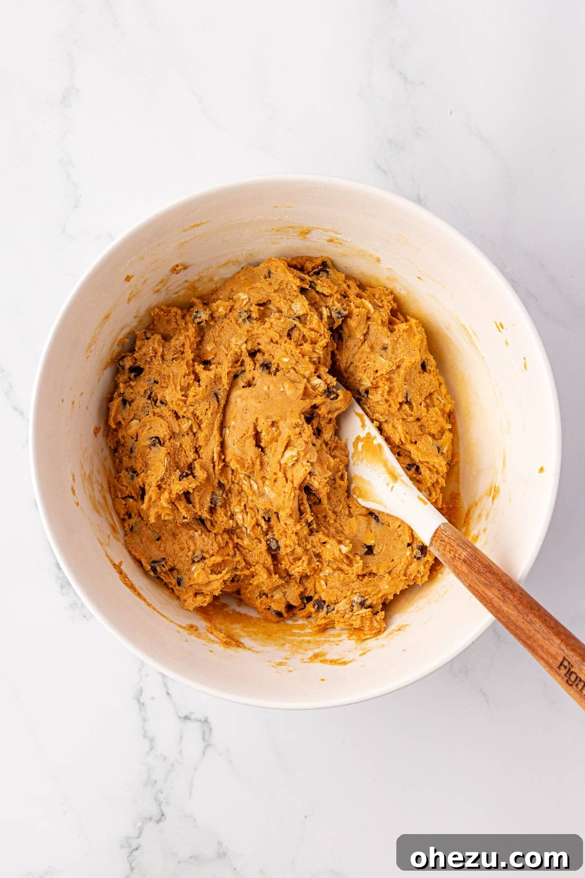 Protein bar batter fully mixed and thick in the bowl