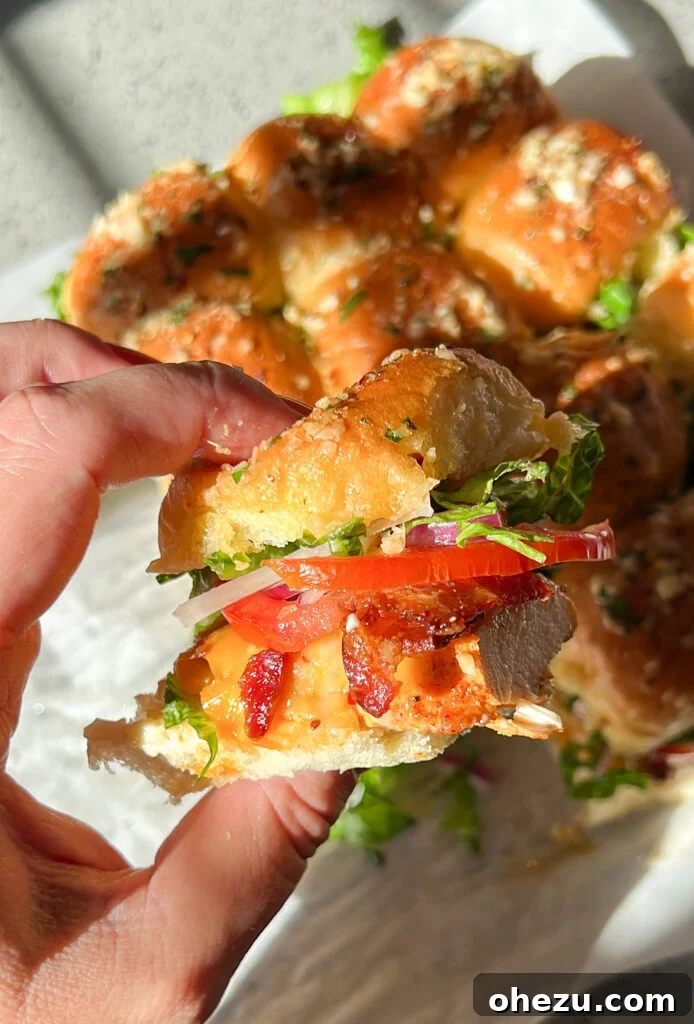 Irresistible Garlic Parmesan Chicken Sliders on Sweet Hawaiian Buns 4 Ingredients for Garlic Parmesan Chicken Sliders laid out on a table