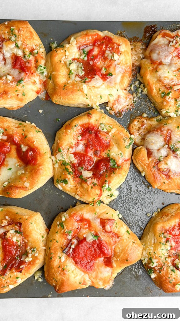 Close-up of Mini Deep Dish Pizzas being assembled in a muffin tin
