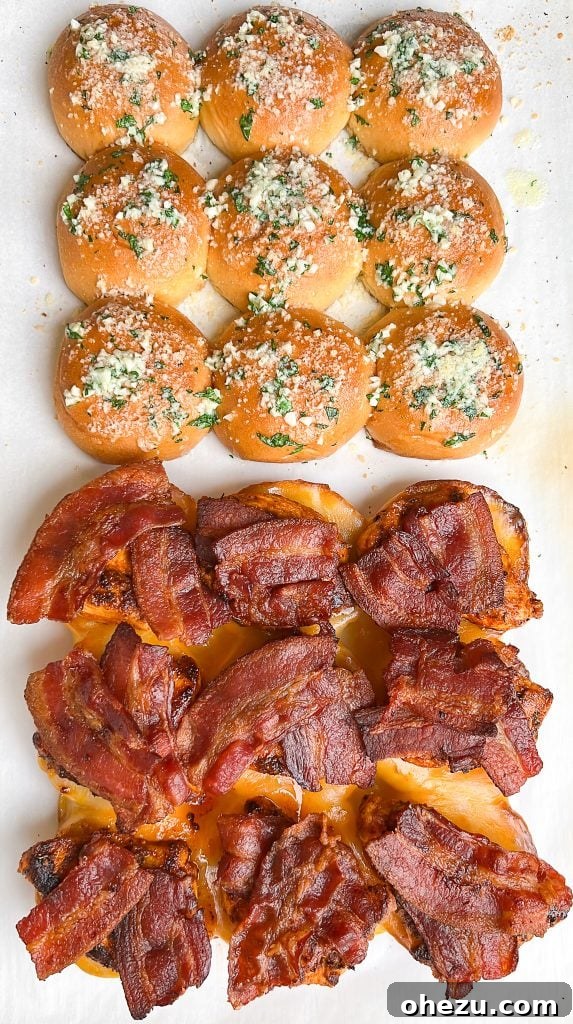 Assembling layers of cheese and bacon on sliders