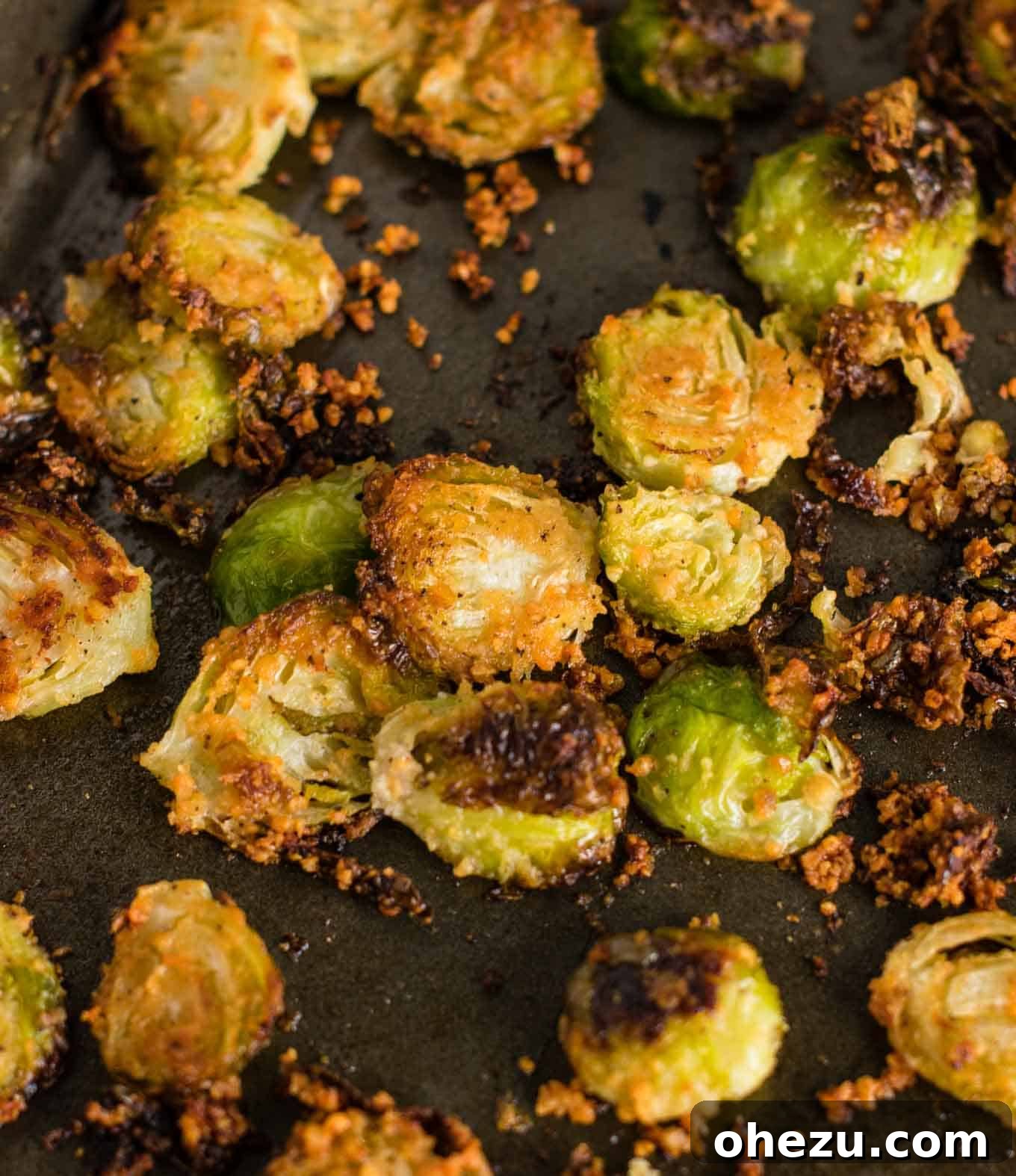 Savory Sprout Crisps 4 close-up of roasted brussel sprouts chips - these are so good I could eat the whole pan myself! #brusselsprouts #brusselsproutchips #dinner #sidedish #vegetarian