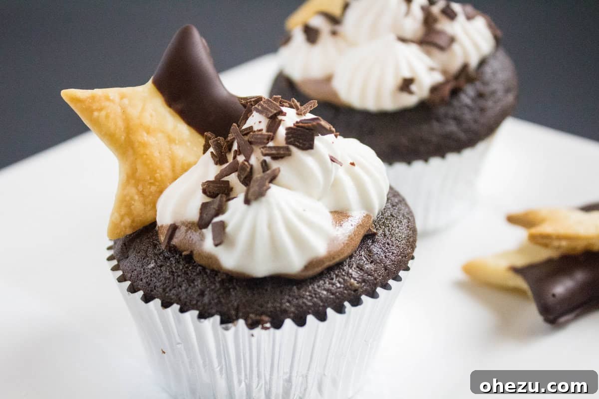 Whiskey Chocolate French Silk Pie Cupcakes 2 Rich Whiskey Chocolate French Silk Pie Cupcake topped with delicate whipped cream and chocolate shavings