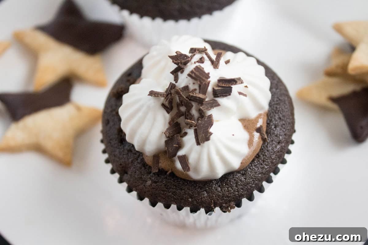 Whiskey Chocolate French Silk Pie Cupcakes 3 Close-up shot of a Whiskey Chocolate French Silk Pie Cupcake, showcasing the creamy filling and a decorative pie crust garnish