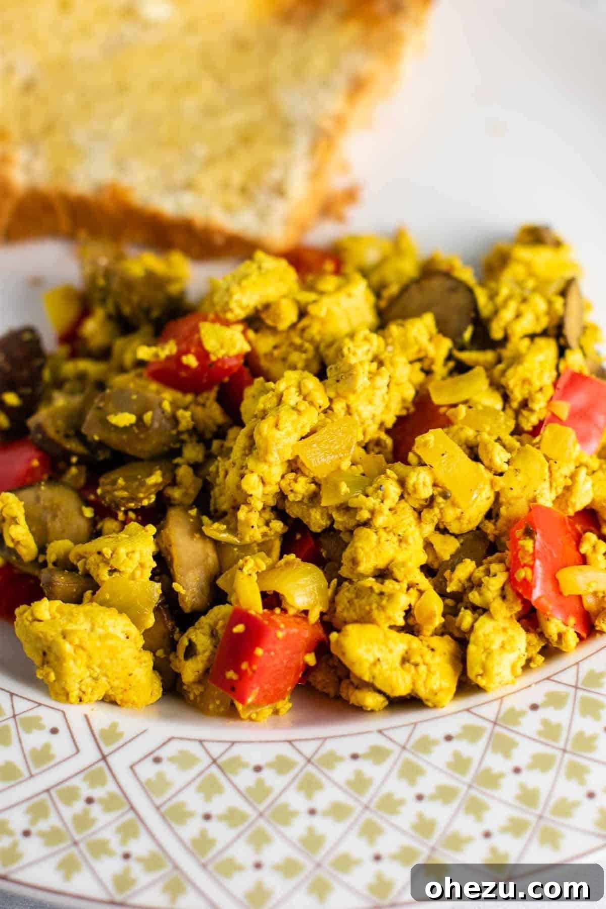 Overhead shot of vegan tofu scramble, ready to be served. Ideal for a wholesome #vegan #breakfast.