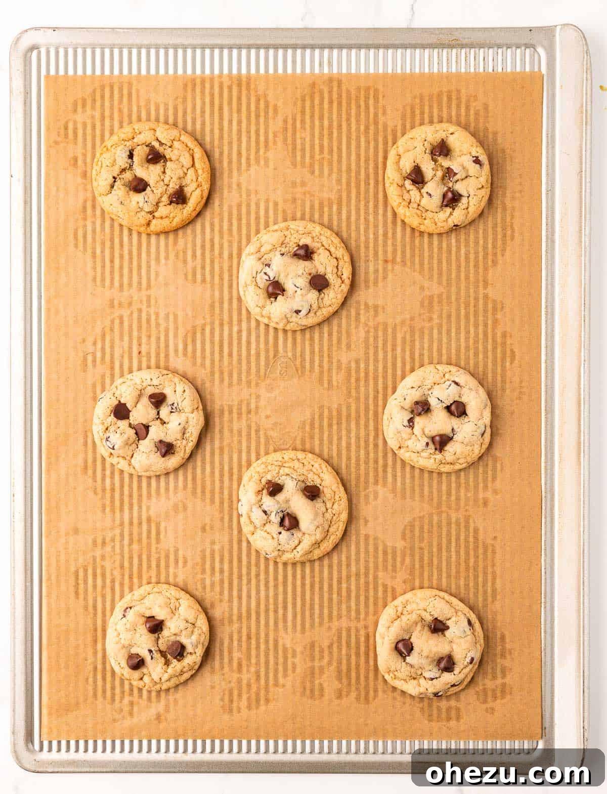 Heavenly Vegan Chocolate Chip Cookies 14 A baking sheet filled with perfectly formed vegan chocolate chip cookie dough balls, ready to go into the oven.