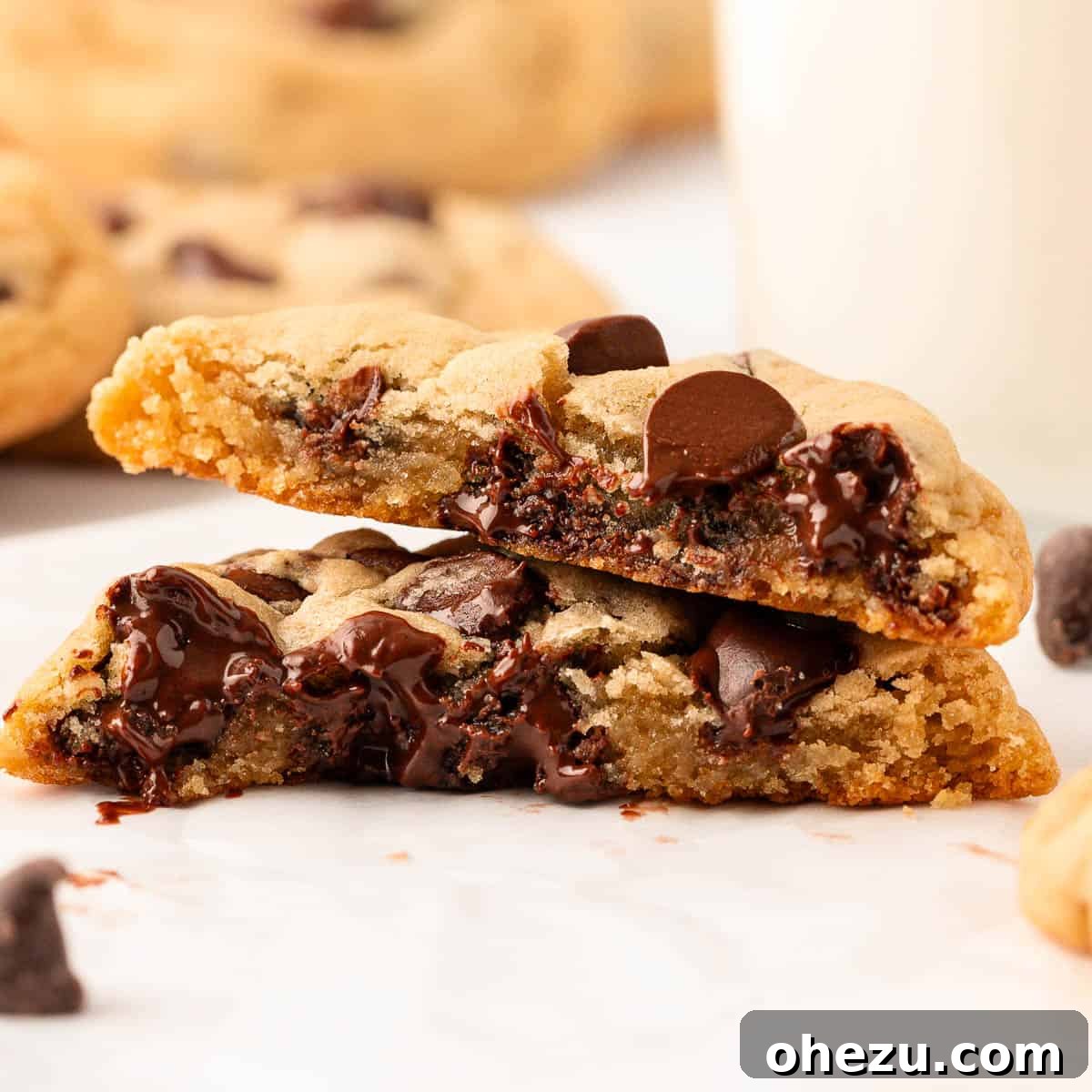 Heavenly Vegan Chocolate Chip Cookies 3 Close-up of a stack of freshly baked vegan chocolate chip cookies, highlighting their soft texture and abundant chocolate chips.