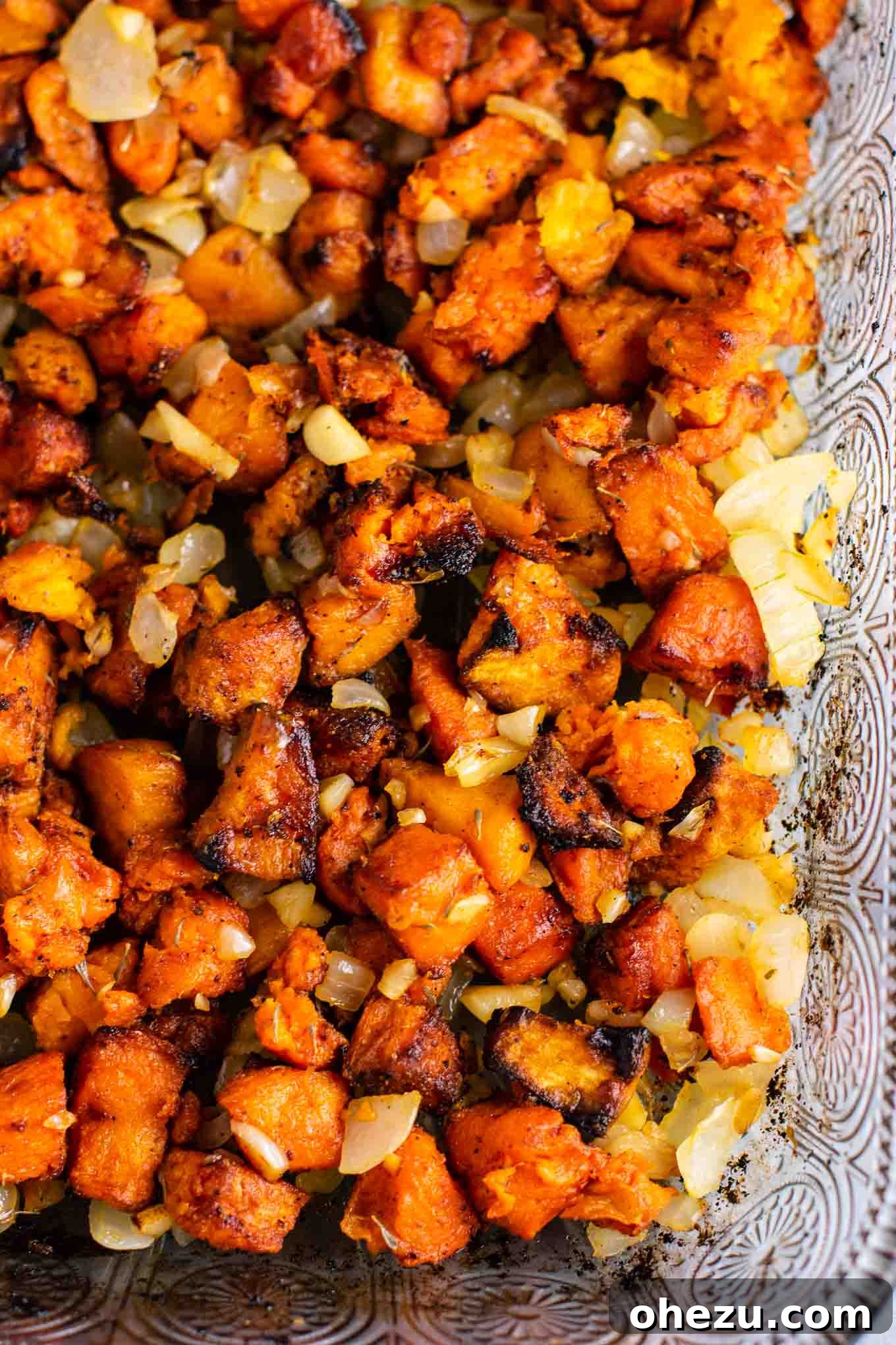 Sweet potato hash recipe with caramelized garlic and onion