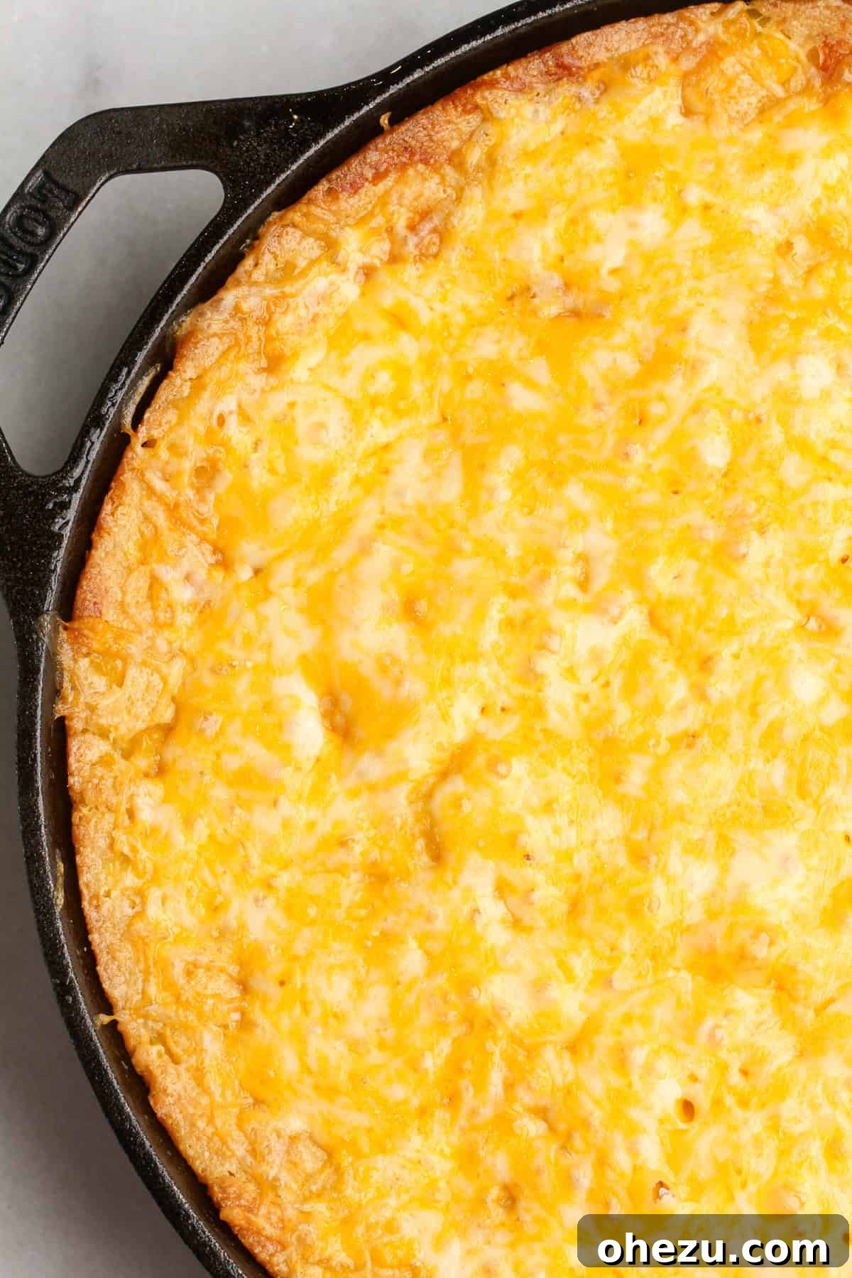 Golden Cheesy Corn Bake 7 A large pan of Jiffy Corn Casserole.