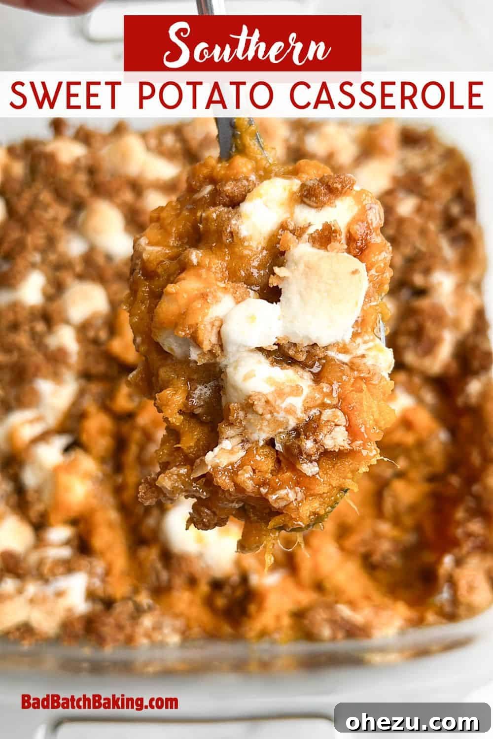 A festive holiday table setting with Southern Sweet Potato Casserole as a centerpiece.