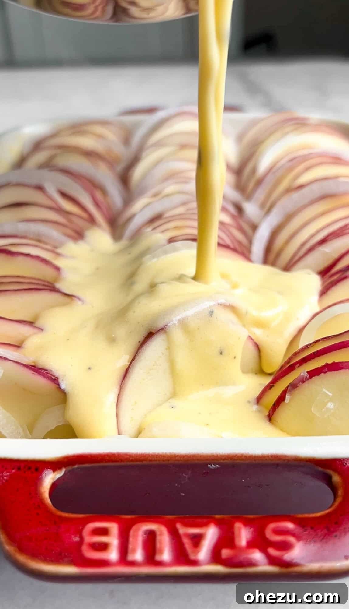 Making the creamy cheese sauce for Scalloped Potatoes Au Gratin