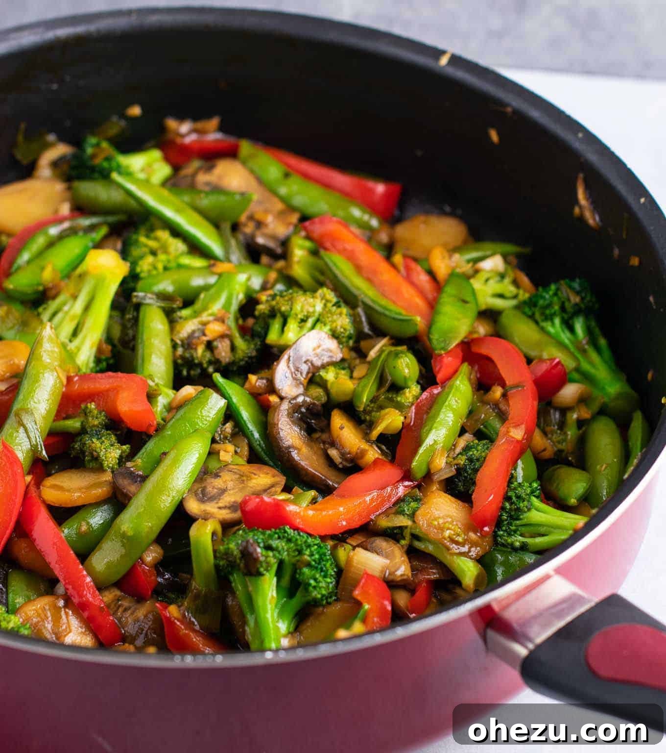 Stir fry with bell pepper, sugar snap peas, broccoli, garlic, ginger, and sauce