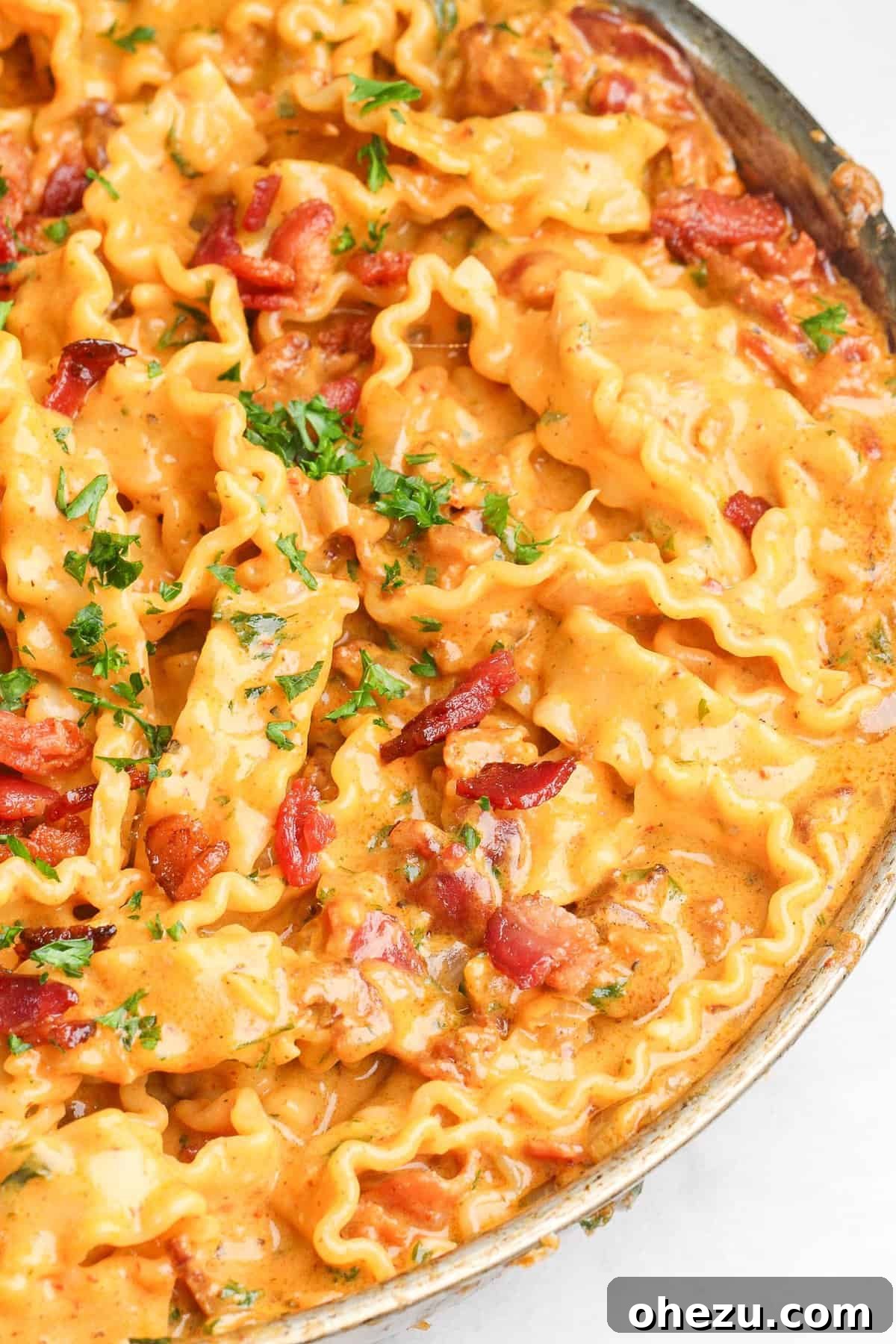 Bold Chipotle Bacon Alfredo 4 Ingredients for Chipotle Bacon Alfredo laid out on a cutting board