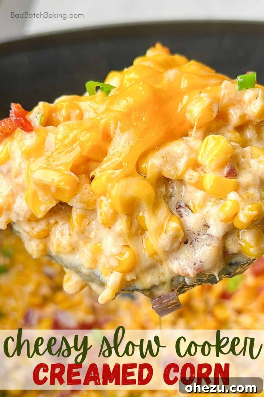 Decadent Slow Cooker Cheesy Creamed Corn 5 Creamy corn cooking in a slow cooker, ready to be stirred