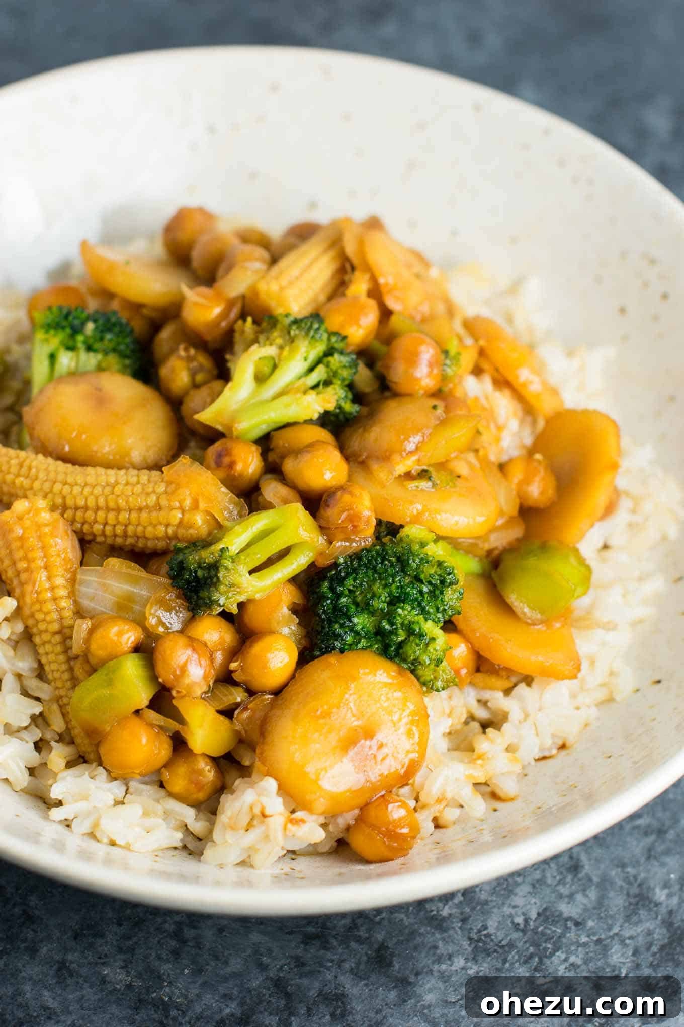 Plant-Powered Chickpea Stir-Fry 4 This easy vegan chickpea stirfry bowl with brown rice will be a hit with the whole family! #vegan #veganstirfry #chickpeastirfry #vegandinner