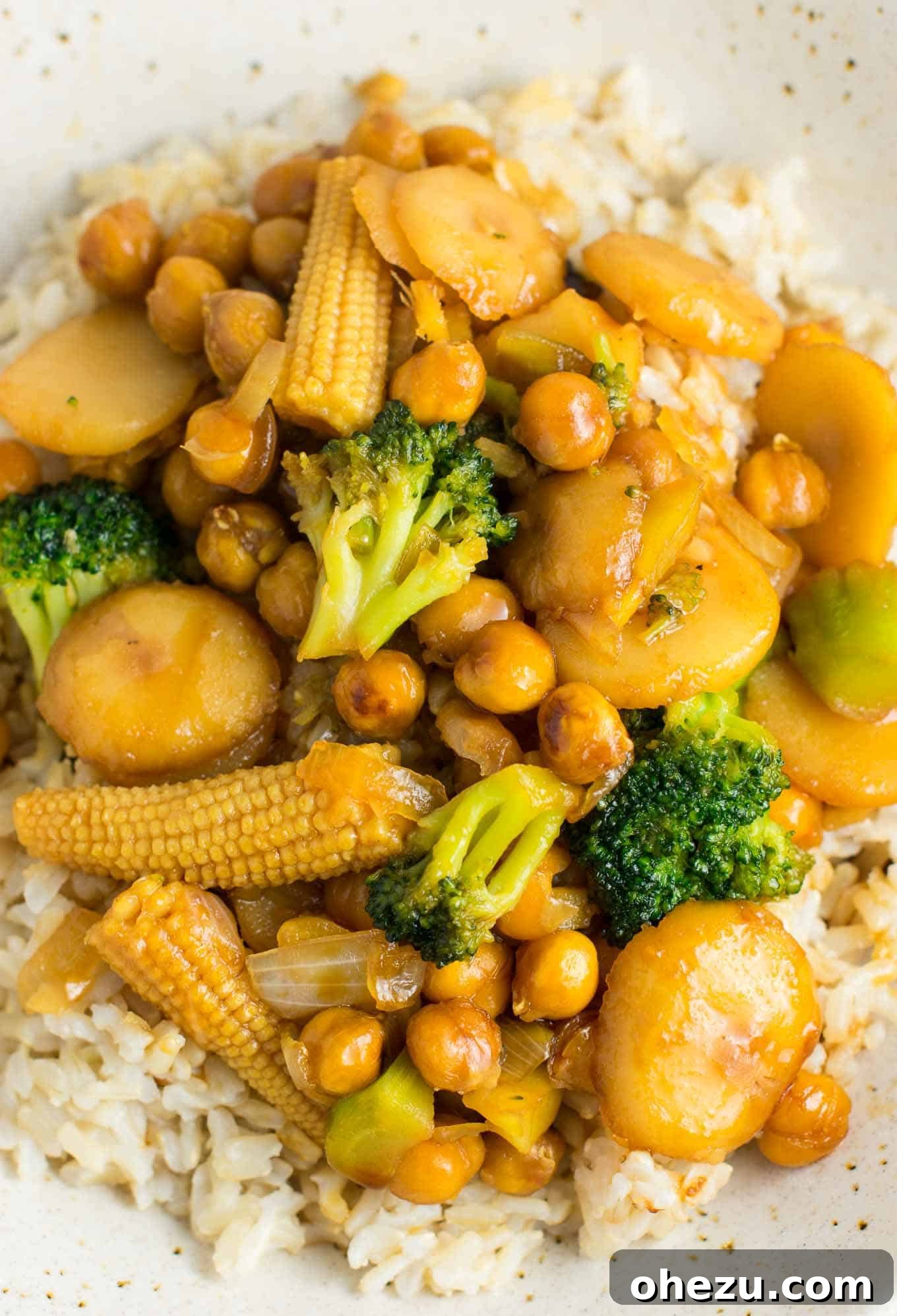 Plant-Powered Chickpea Stir-Fry 5 This easy vegan chickpea stirfry bowl with brown rice will be a hit with the whole family! #vegan #veganstirfry #chickpeastirfry #vegandinner
