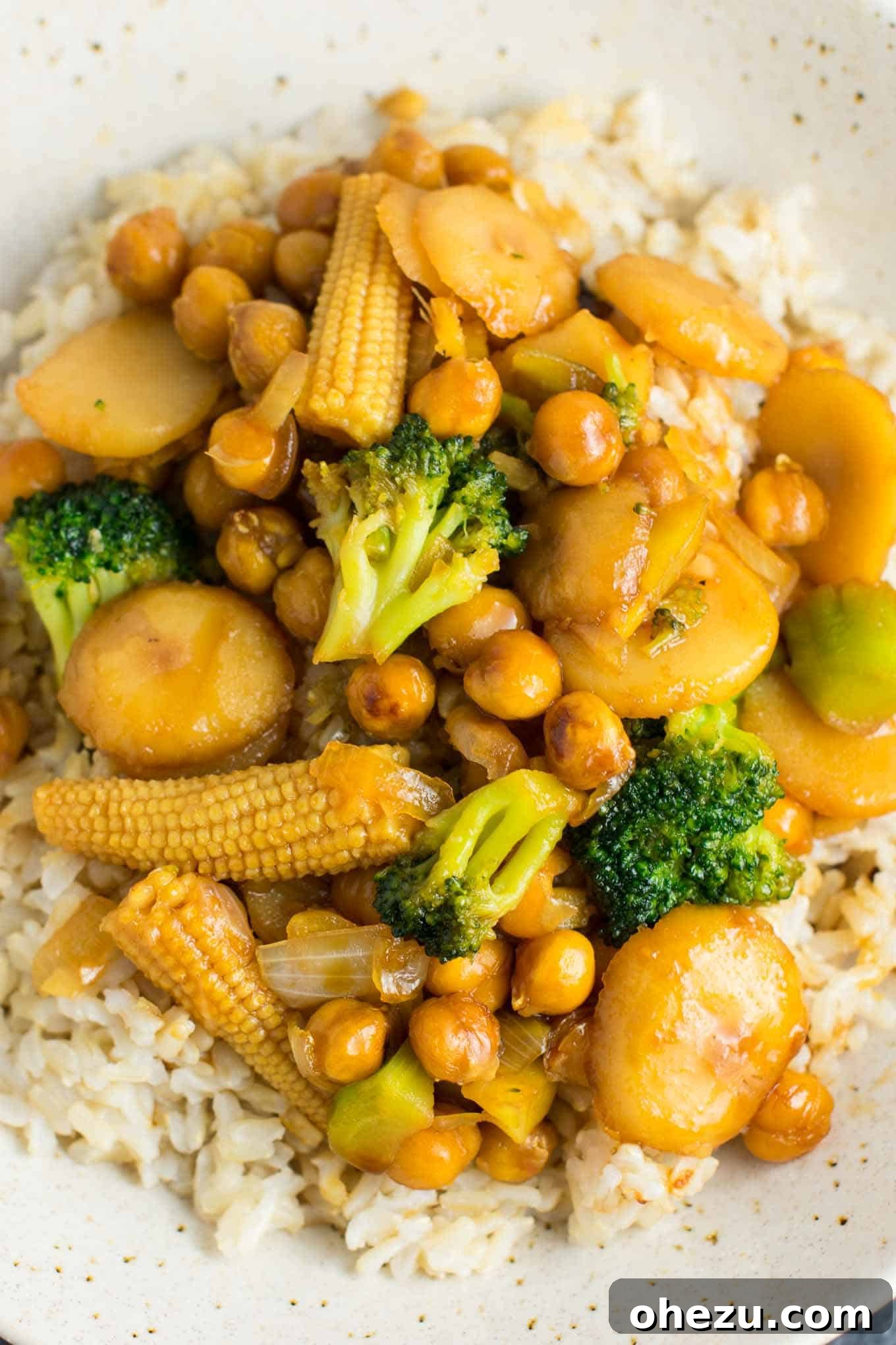 Plant-Powered Chickpea Stir-Fry 7 This easy vegan chickpea stirfry bowl with brown rice will be a hit with the whole family! #vegan #veganstirfry #chickpeastirfry #vegandinner