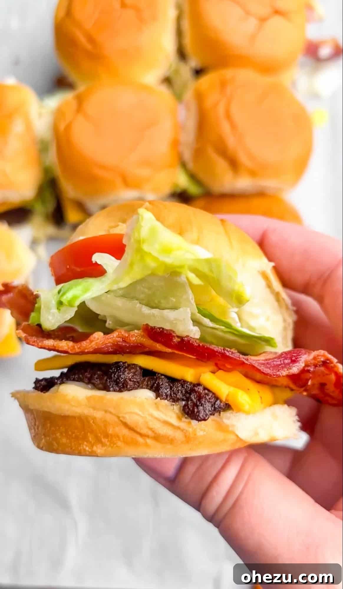 Classic Jr. Bacon Cheeseburger Sliders arranged on a platter, ready to be served for a game day or party.