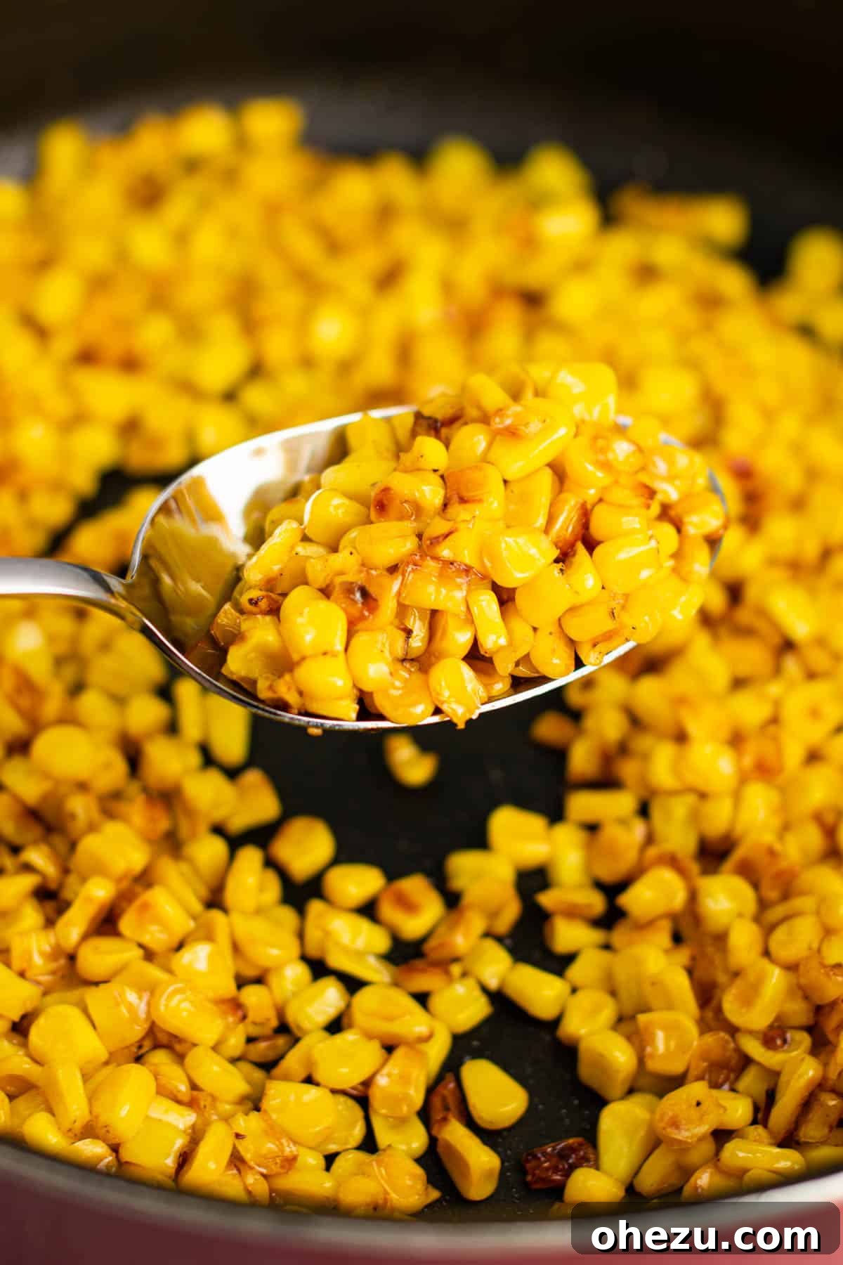 Sizzling Skillet Corn 8 a close-up of the delicious skillet corn in a bowl
