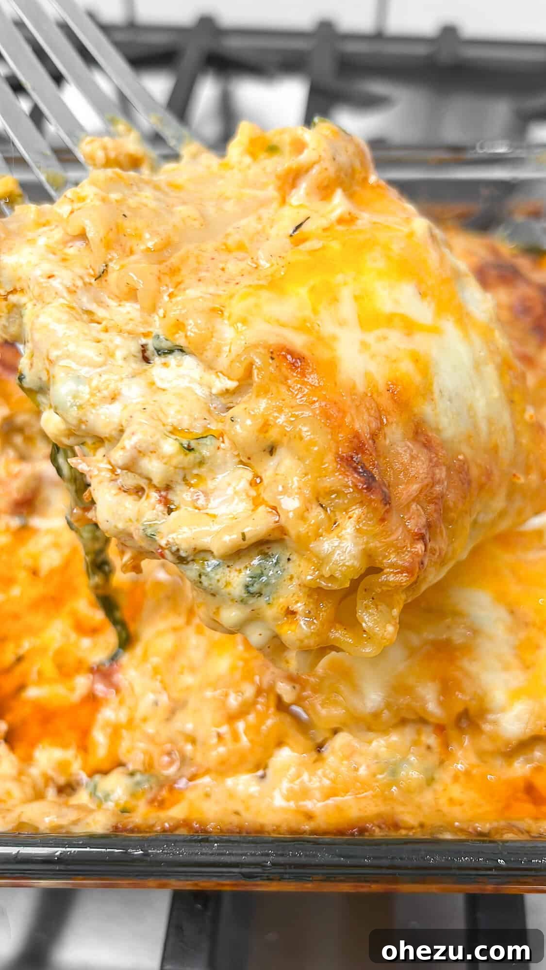 Delicious baked Cajun Chicken Lasagna Roll-ups, perfect for a cozy meal