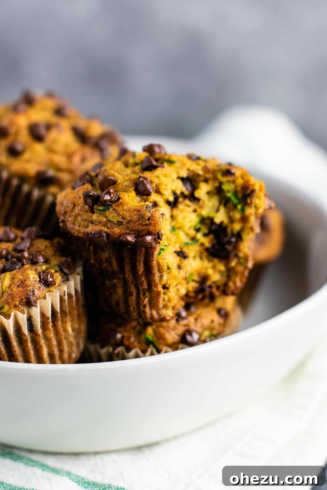 Vibrant Pinterest pin image for healthy zucchini chocolate chip muffins, highlighting their deliciousness and ease of preparation for summer.