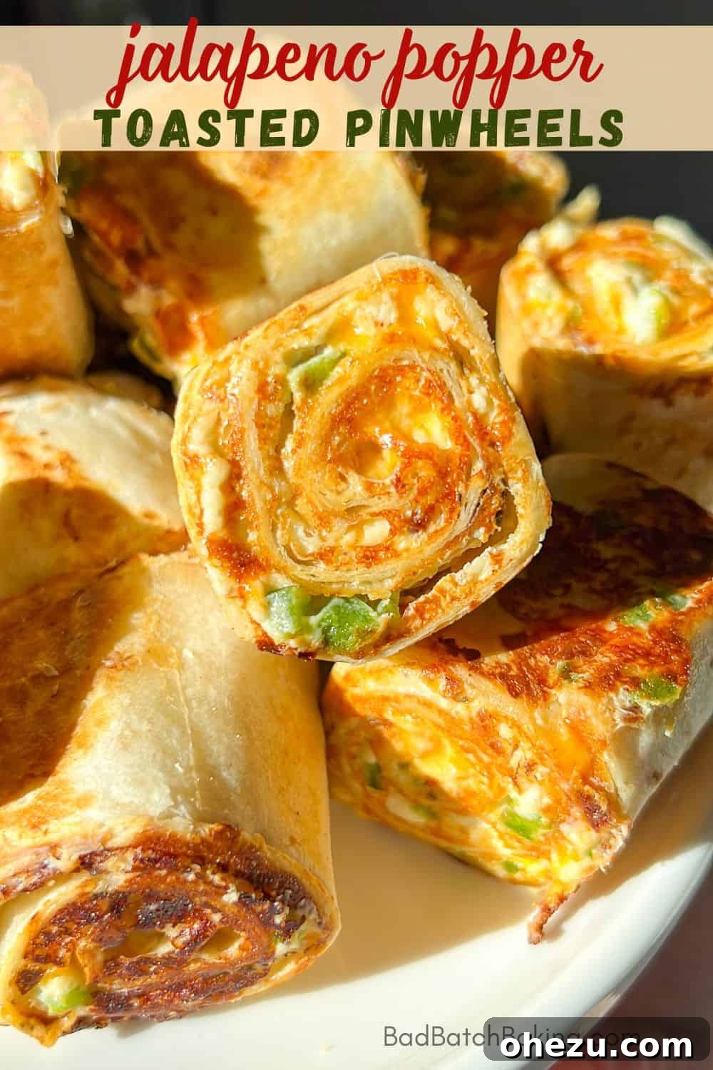 A selection of game day appetizers including pinwheels and other snacks