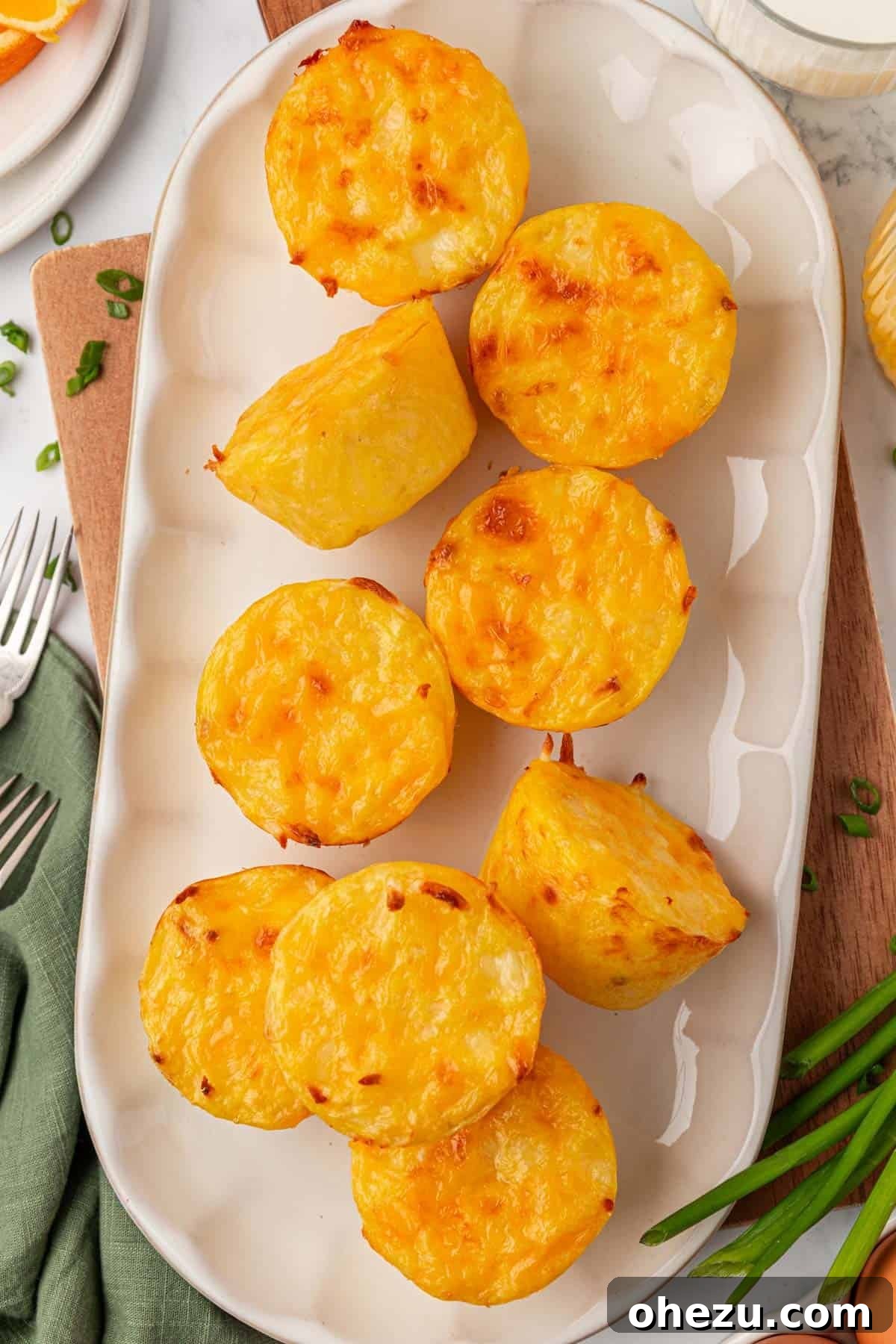 a stack of warm hash brown egg cups, ready to be enjoyed