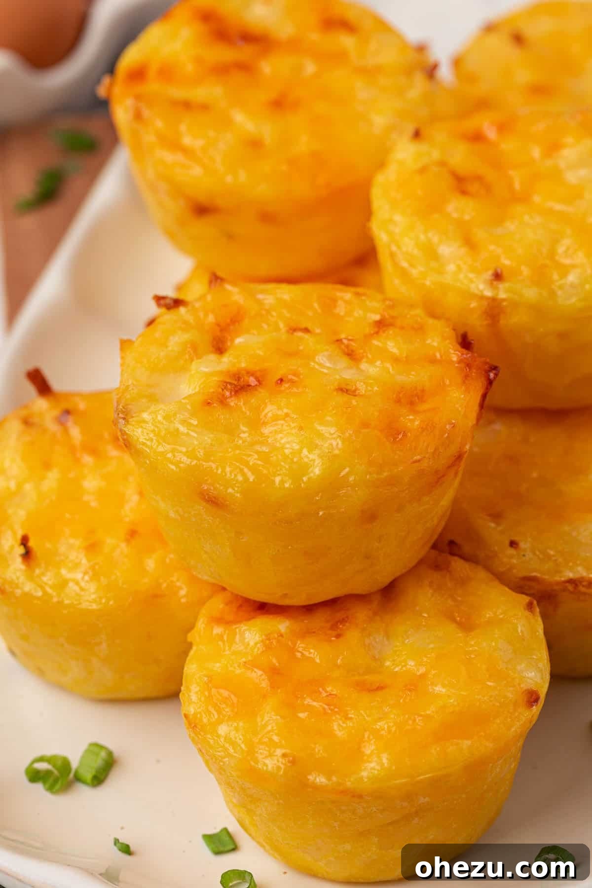 a close-up shot of a single hash brown egg cup, showcasing its golden perfection