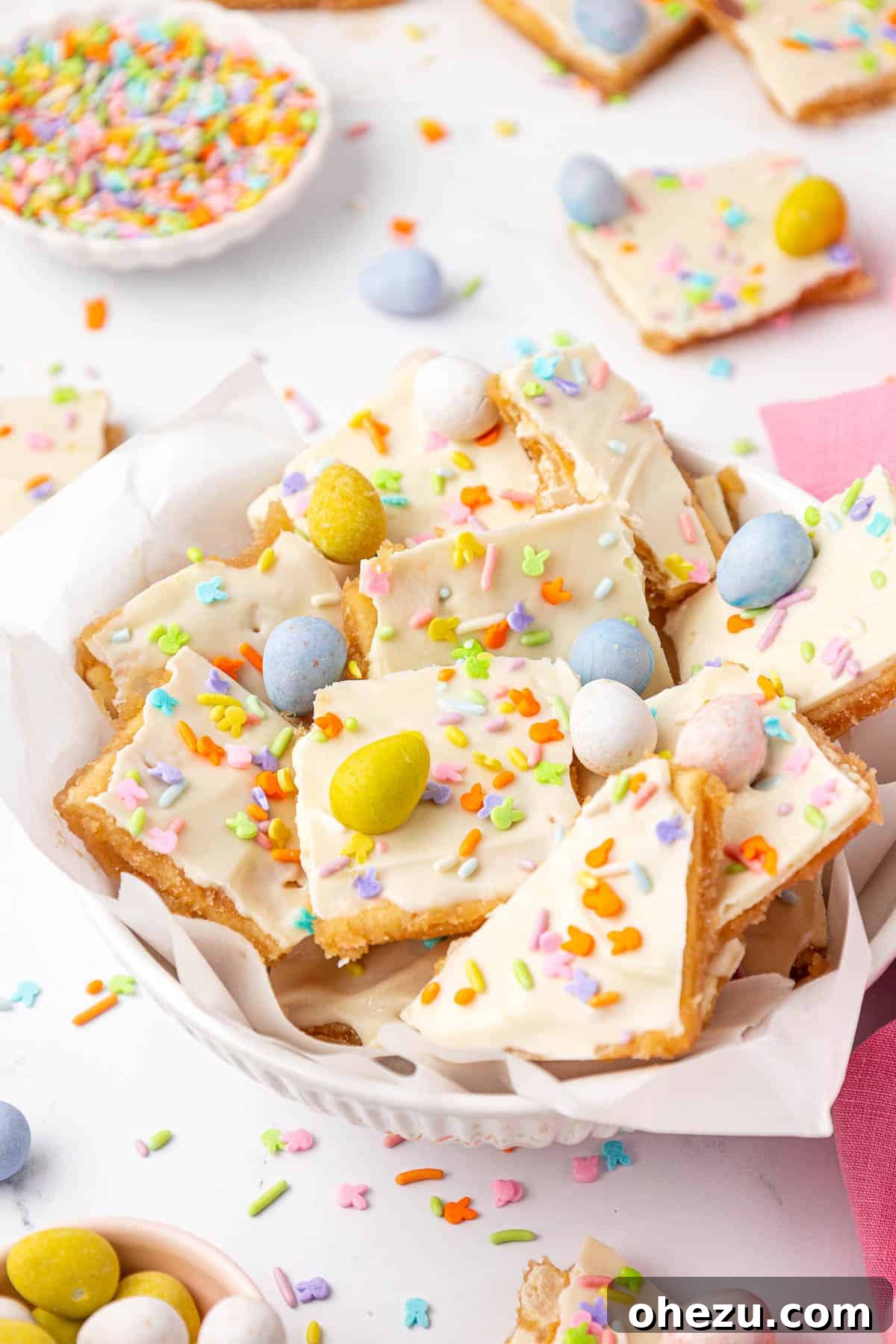 Multiple pieces of Easter crack toffee neatly laid out on parchment paper, ready to be enjoyed or stored