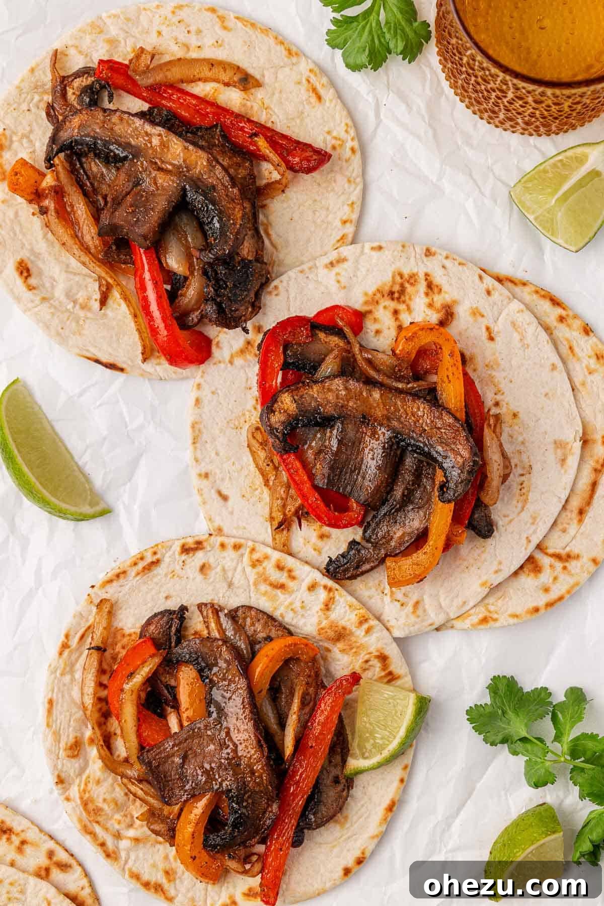 Smoky Portobello Fajita Sizzle 14 Portobello mushroom fajitas with a variety of colorful toppings laid out for customization