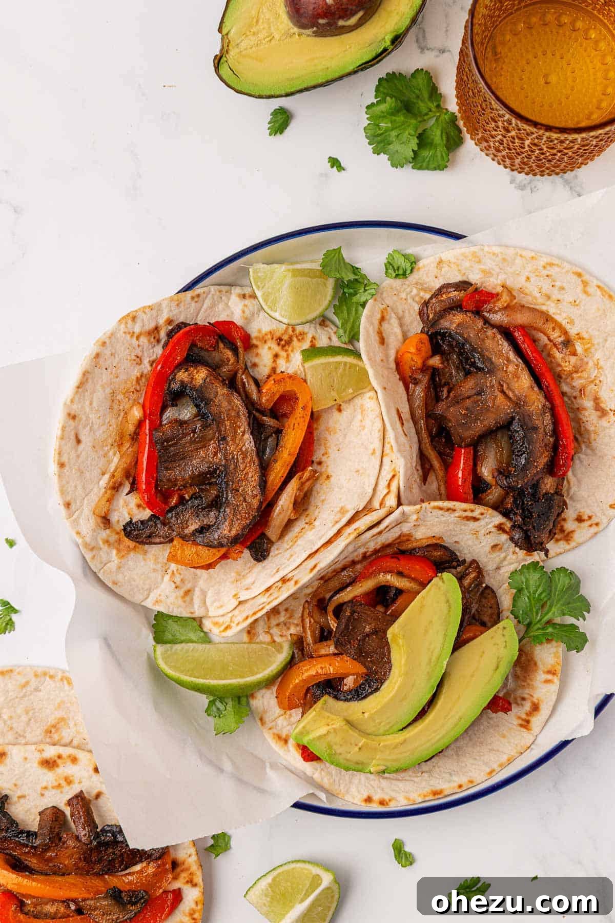 Smoky Portobello Fajita Sizzle 16 Delicious portobello mushroom fajitas arranged on a serving plate, ready to be enjoyed