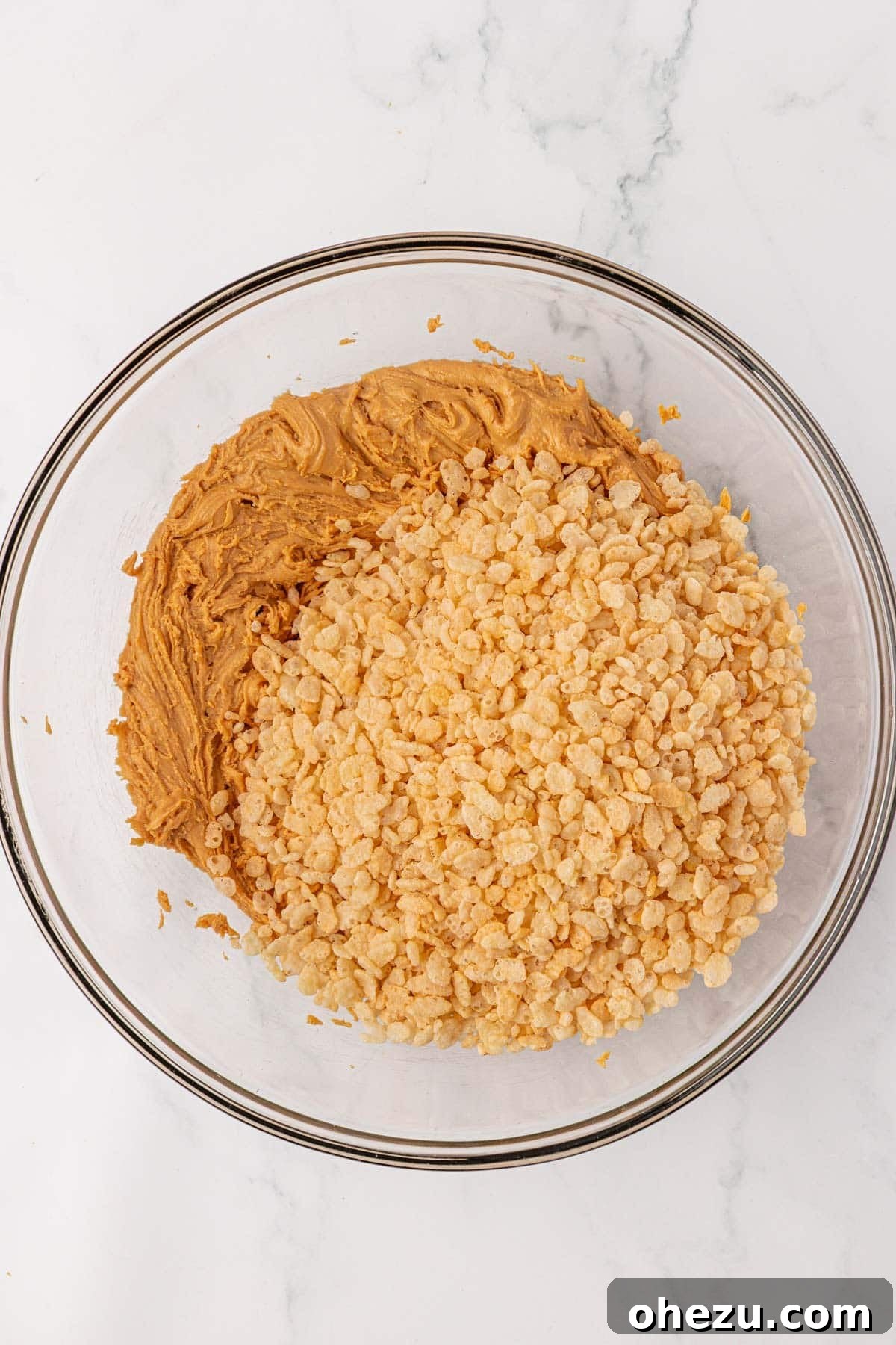 Chewy Peanut Butter Rice Krispie Bars Recipe 9 adding the rice krispies to the peanut butter mixture