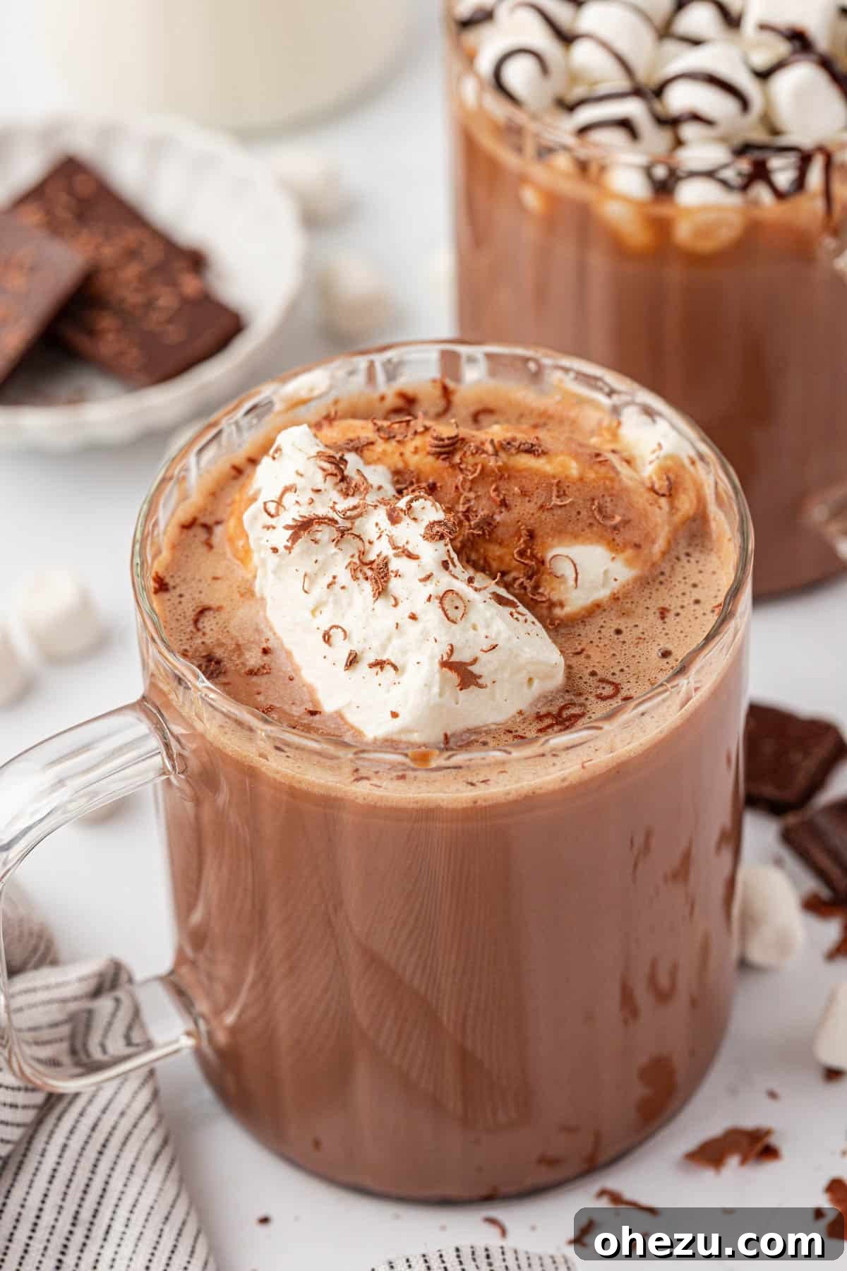 How to Make Rich Homemade Hot Chocolate 12 hot chocolate topped with whipped cream and chocolate shavings