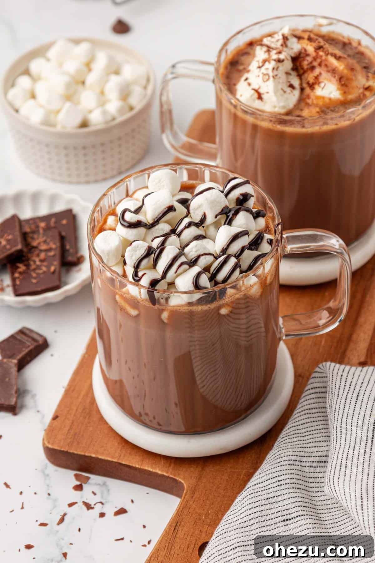 How to Make Rich Homemade Hot Chocolate 14 hot chocolate topped with marshmallows and chocolate syrup