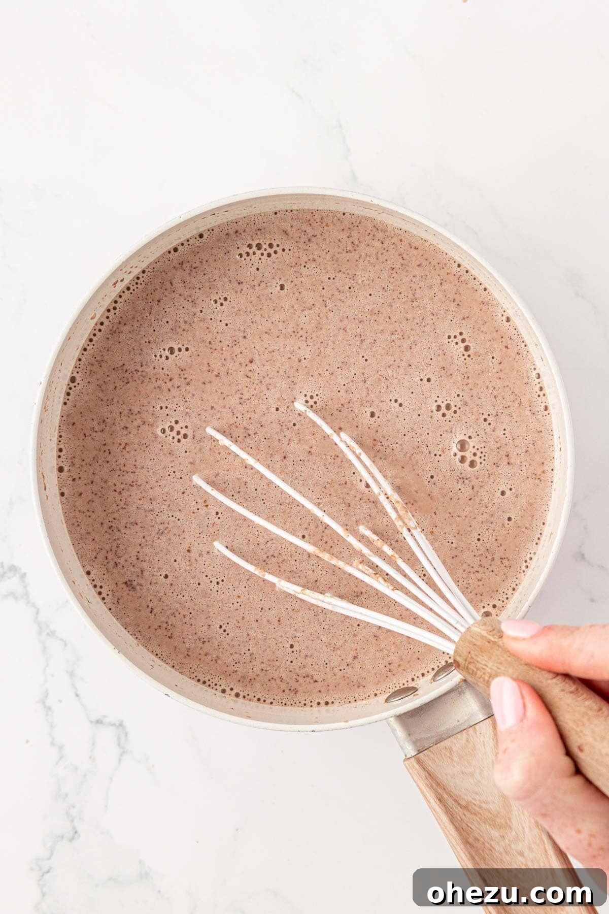 How to Make Rich Homemade Hot Chocolate 6 whisking the hot chocolate